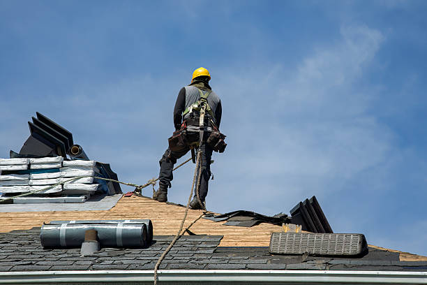 Professional Roofing technician working in Kendall, NY